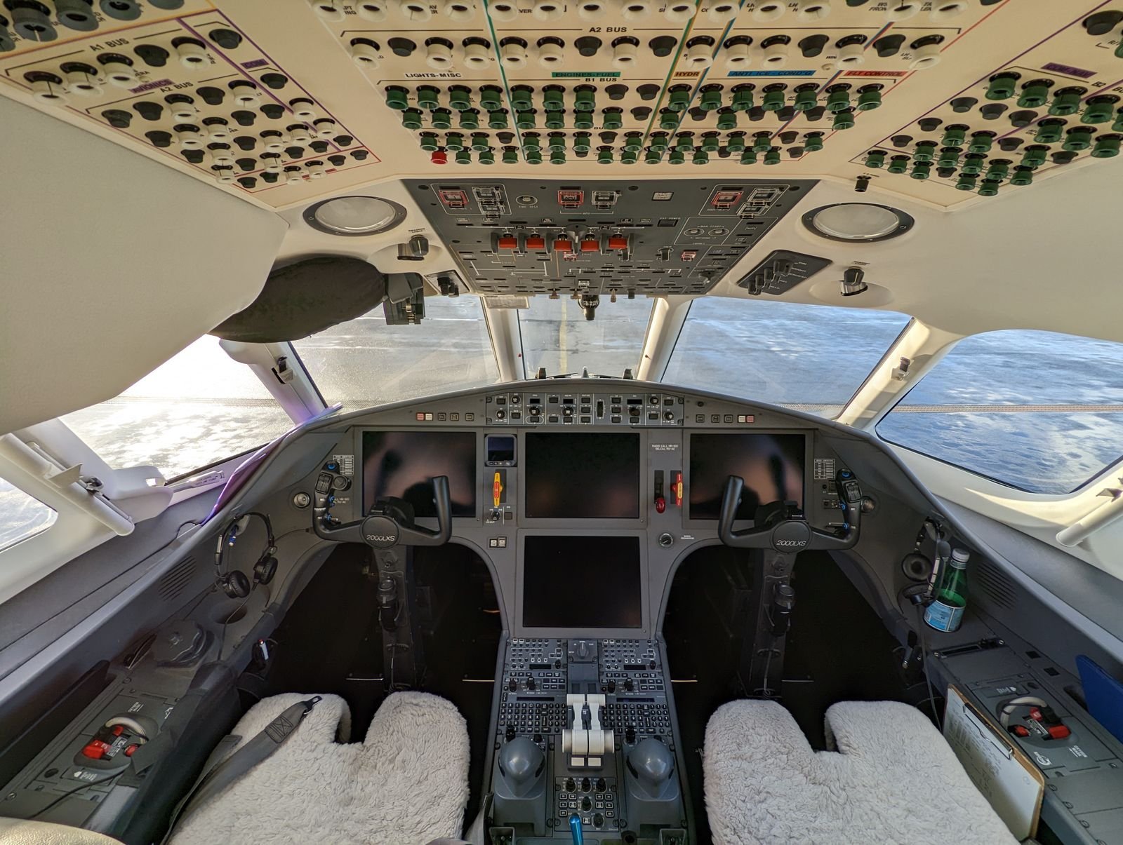 Modern aircraft cockpit with flight control and navigation systems