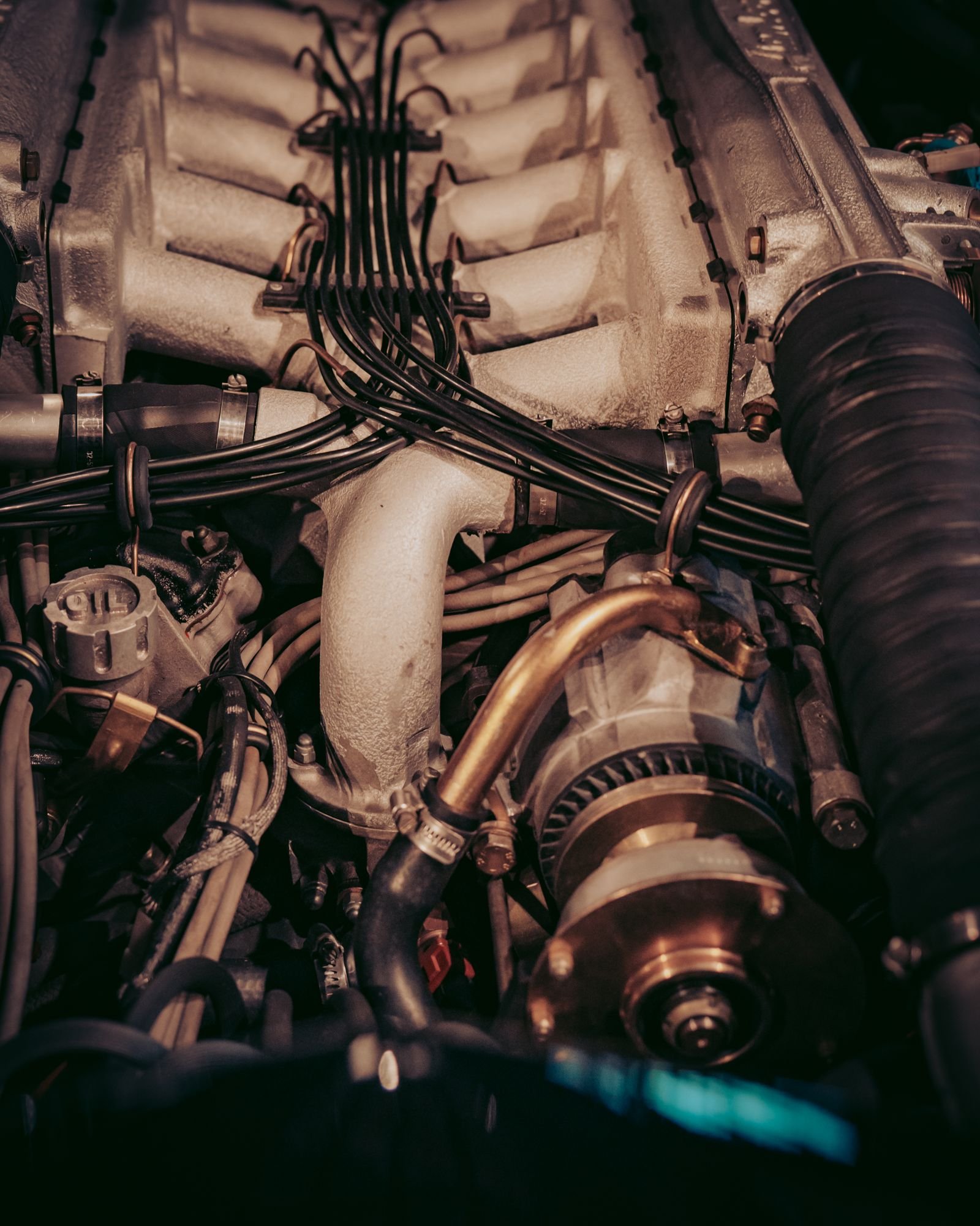 Automotive engine compartment with electrical wiring and components